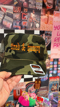 Load image into Gallery viewer, Tired & Hungry Trucker Hat Camo